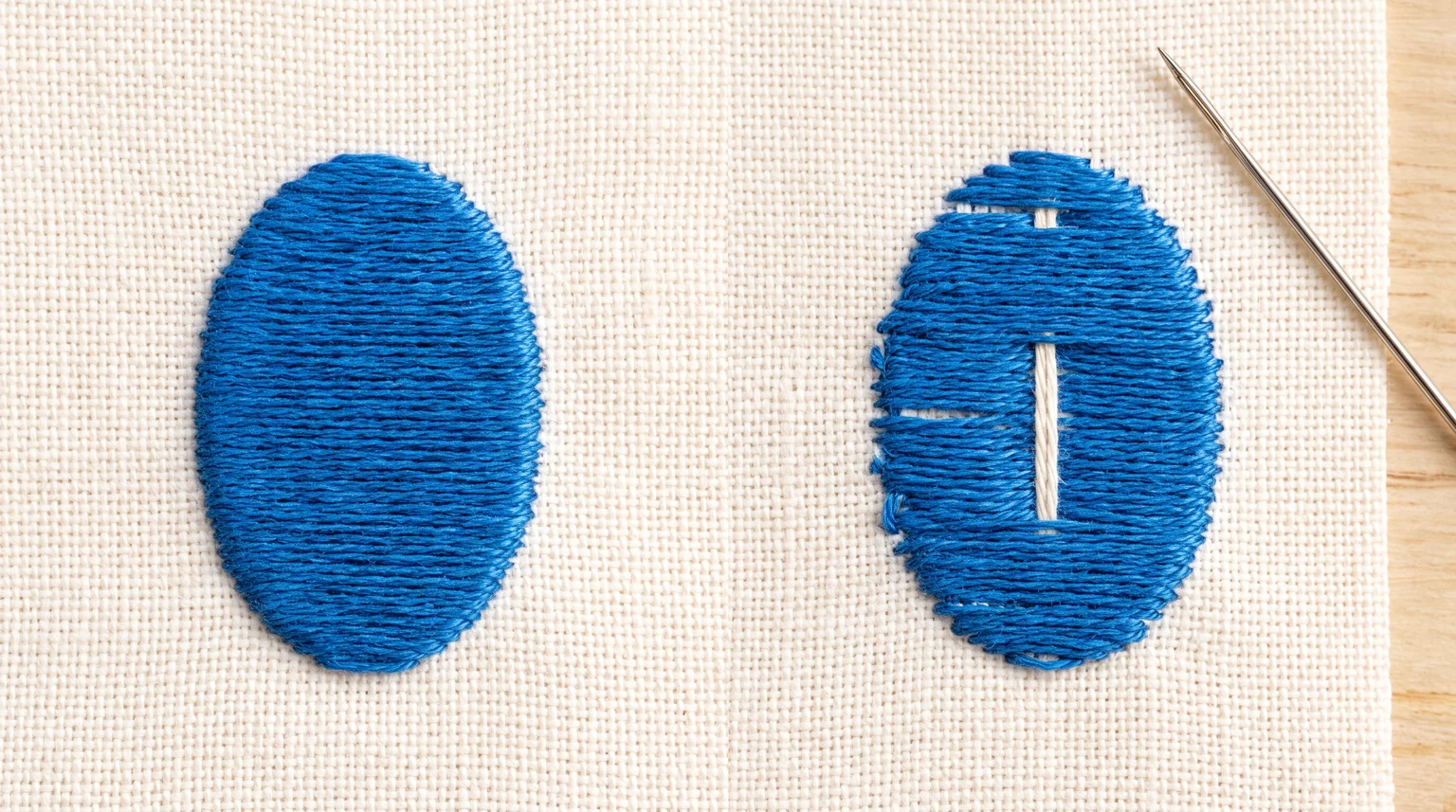Two blue satin-filled ovals, one fully covered and one with gaps exposing white material beneath the fill
